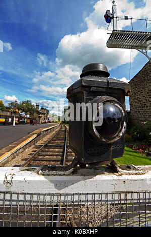 Level Crossing at Oakworth Station on the Keighley & Worth Valley Railway line in West Yorkshire. Stock Photo