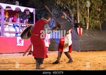 Alburquerque, Spain - august 19, 2017: Two knights fighting during Medieval  festival in Alburquerque, Extremadura, Spain Stock Photo