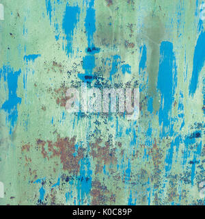 Old blue painted wall with rust texture. Grunge rusted metal background. Rust stains. Stock Photo