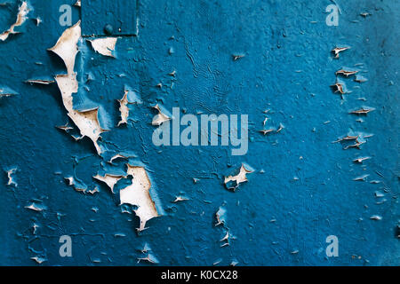Colored concrete background with peeling old paint. Stock Photo