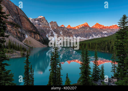 Moraine lake at sunrise in Banff National Park Stock Photo