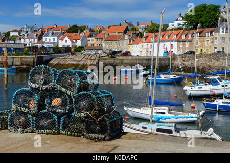 Lobster pots on quayside at St Monans harbour in East Neuk of Fife, Scotland, UK Stock Photo