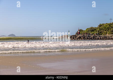 Surfers at Beach of Barra da Lagoa area of Lagoa da Conceicao - Florianopolis, Santa Catarina, Brazil Stock Photo