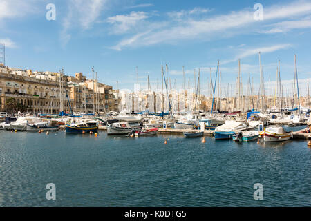 Pleasure boats and yachts moored in the grand Harbour at Birgu Malta Stock Photo