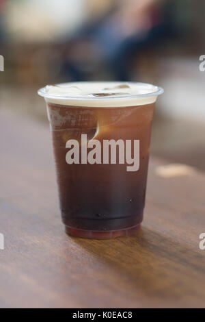 Sparkling Nitro Cold Brew Coffee in plastic take away cup ready to drink Stock Photo