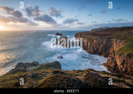 The view towards the rock arch Enys Dodnan at Land's End. Stock Photo