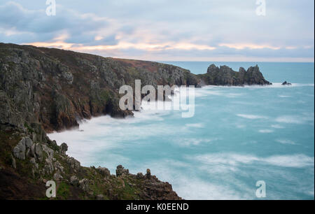 The view towards Logan Rock from Treen in West Cornwall. Stock Photo