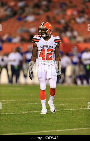 Cleveland Browns running back Terrence Magee (33) is stopped by