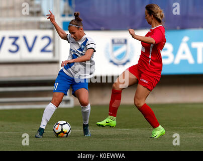 BUDAPEST, HUNGARY - AUGUST 22: Dora Papp #11 of MTK Hungaria FC dribbles next to Ambra Gjegji (R) of WFC Hajvalia during the UEFA Women's Champions League Qualifying match between MTK Hungaria FC and WFC Hajvalia at Nandor Hidegkuti Stadium on August 22, 2017 in Budapest, Hungary. Stock Photo
