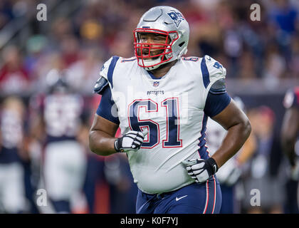 New England Patriots quarterback Tom Brady (12) and offensive tackle Isaiah  Wynn (76) look upfield in the first period an NFL preseason football game  against the Carolina Panthers, Thursday, Aug. 22, 2019