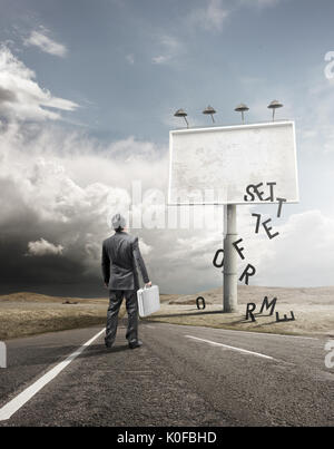 A business man standing and staring at a blank billboard advertisement with falling letters.