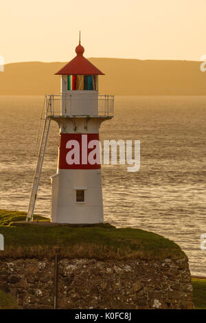 Skansin lighthouse at sunrise, historical fortress, Tórshavn, island of Streymoy, Faroe Islands, Denmark Stock Photo
