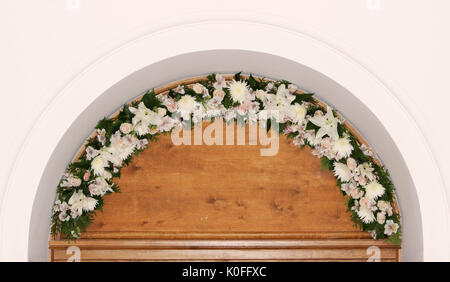 A flower bouquet of cream roses and chrysanthemums on the windows in the  church as a decoration of the holiday. Professional floristics Stock Photo  - Alamy