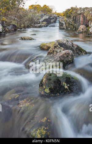 Long exposure of stream on Dartmoor National Park, Devon, UK. Stock Photo