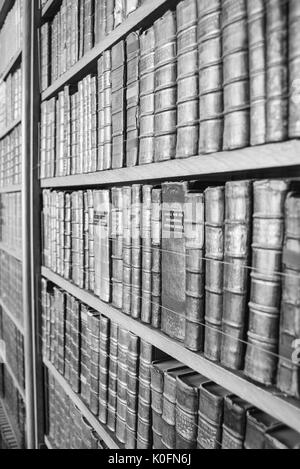 Old books on shelf in the Library Stock Photo - Alamy