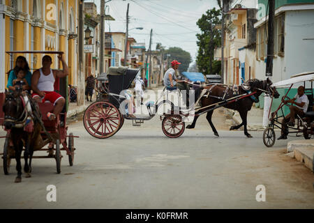 Cuban, Cuba, Cardenas, horses and bikes are the main transport  around the streets near  park Plaza de Spriu Stock Photo
