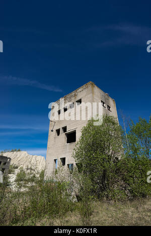 Abandoned mines mountain and hauses. Quarry and old prison architecture. The ashes dunes in  Estonia, Europe. Stock Photo