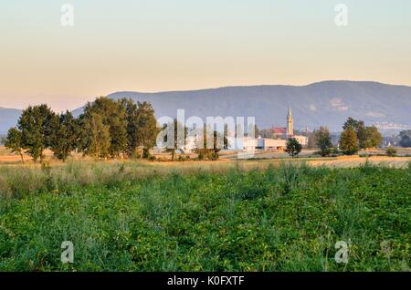 Summer rural landscape. Countryside in Poland against the background of beautiful hills. Stock Photo