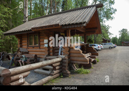 KIVACH, KARELIA, RUSSIA - CIRCA JUN, 2017: Wooden timber house is an entrance and ticket house of the Kivach waterfall national park. The Kivach Natur Stock Photo