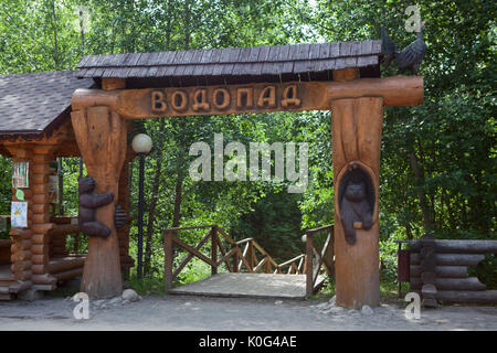 KIVACH, KARELIA, RUSSIA - CIRCA JUN, 2017: Wooden timber gate to the Kivach Falls. The Kivach Nature Reserve is specially guarded natural territory. I Stock Photo