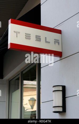 Tesla logo sign outside an automobile dealership in Vancouver, BC, Canada Stock Photo