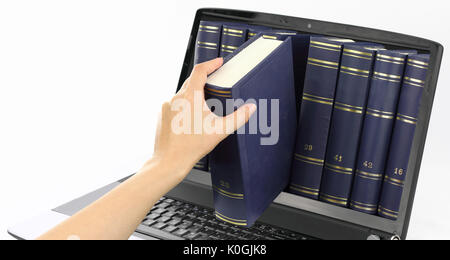 Laptop computer with books, isolated on white Stock Photo