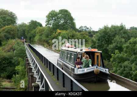 Narrowboat crossing Edstone Aqueduct on the Stratford-upon-Avon Canal, Bearley, Warwickshire, UK