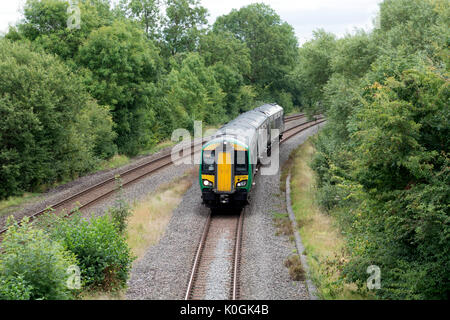 London Midland class 172 diesel train on the Stratford-upon-Avon to Birminham line near Bearley, Warwickshire, UK Stock Photo