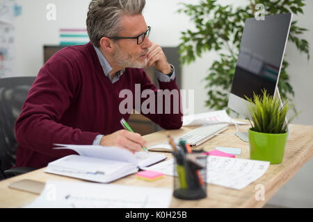 Busy day is normal at this work Stock Photo