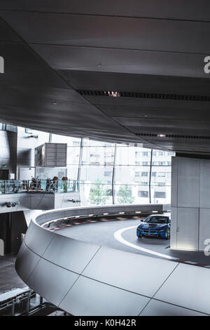 Munich, Germany - May 24, 2016. The modern interior of the BMW World in Munich, Germany. The BMW World was designed by the Austrian Architects Coop Himmelb(l)au and showcase the BMW technologies, engine construction, the design process and the current BMW models. Stock Photo
