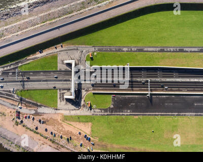 An above-ground pedestrian crossing above the entrance to the vehicular underground tunnel under the passageway C1. Dam. St. Petersburg, Russia Stock Photo