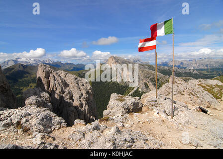 Dolomites, Veneto, Italy. Sign of peace on Sasso di Stria. In the background the Marmolada Stock Photo
