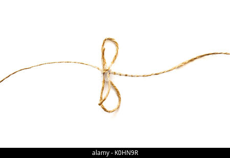 Flax rope with bow on white background Stock Photo