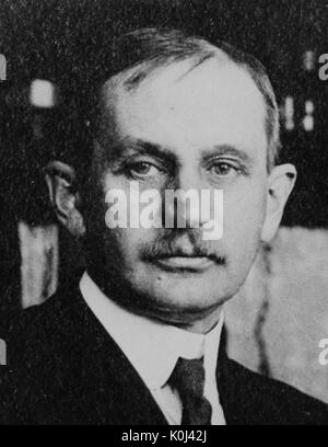 Head shot of original faculty member of Johns Hopkins University Medicine, Franklin Paine Mall, wearing a dark suit and dark tie with a white shirt, with a serious facial expression. 1915. Stock Photo