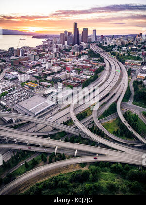 Tall portrait of Pacific Northwest coastal city at dusk with purple and pink colors Stock Photo