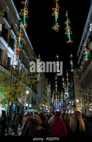 Iluminación de Navidad en la calle Arenal. Madrid capital. España Stock Photo