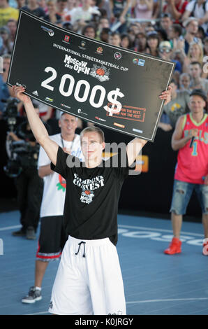 MOSCOW, RUSSIA - JULY 28: Latvian Kristaps Dargais take the second place in slam dunk contest during International Street Basketball Cup 'Moscow Open' Stock Photo