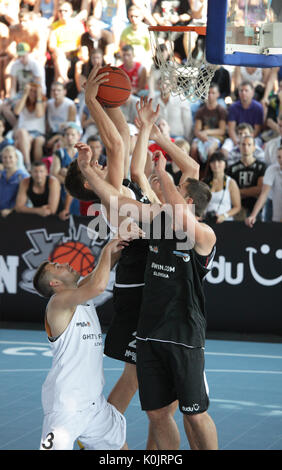 MOSCOW, RUSSIA - JULY 28: Match 'Bwin.com', Slovenia vs 'Ghetto Family', Latvia during International Street Basketball Cup 'Moscow Open' in Moscow, Ru Stock Photo