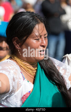 July 1, 2017 Cotacachi, Ecuador: a chantingKichwa woman celebrating Punchi Warmi Stock Photo