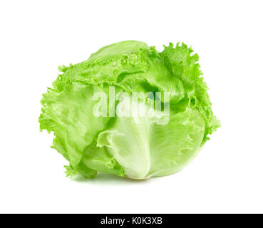 A single head of crisp green iceberg lettuce on a textured gray ...