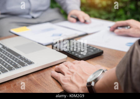 Business meeting  in outdoor. documents account managers crew working with new startup project Idea presentation, analyse marketing plans. Stock Photo