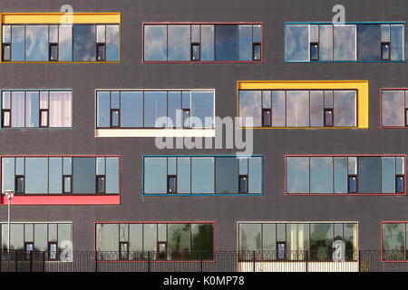 colored windows of the building. geometric background. building's facade. Stock Photo