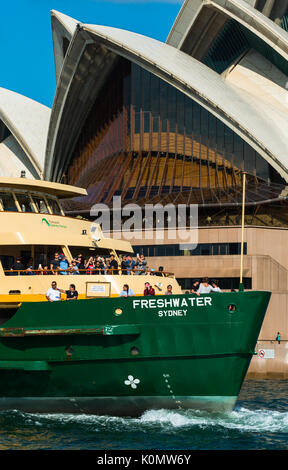 Closeup of Manley Ferry passing near to Sydney Opera house, Sydney, New South Wales, Australia