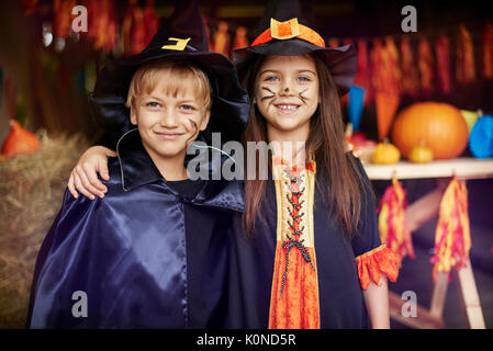 They aren't similar but they are siblings Stock Photo