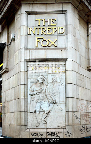 London, England, UK. Site of The Intrepid Fox (pub 1784-2006, founded by Samuel House: now a hamburger restaurant) at 97/99 Wardour Street. Faience (t Stock Photo