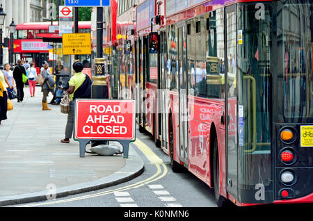 London, England, UK. Buses queuing in Whitehall due to road closed ahead Stock Photo