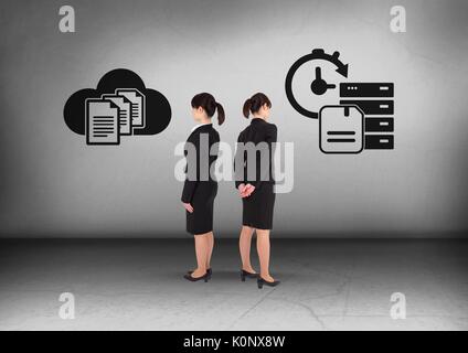Digital composite of Computer file storage options with Businesswoman looking in opposite directions Stock Photo