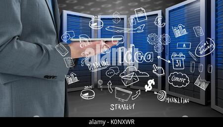 Digital composite of Business man holding a tablet and graphics in server room Stock Photo