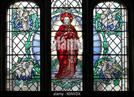 Stained Glass Window depicting Christ with Four Beasts of the Apocalypse Stock Photo