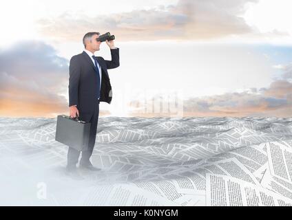 Digital composite of Businessman with binoculars and briefcase in sea of documents under sky clouds Stock Photo
